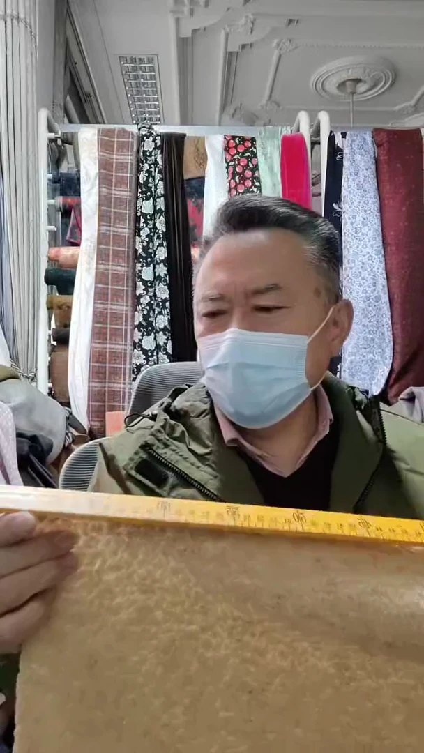 驼黄色纯色圈圈微瑕布料