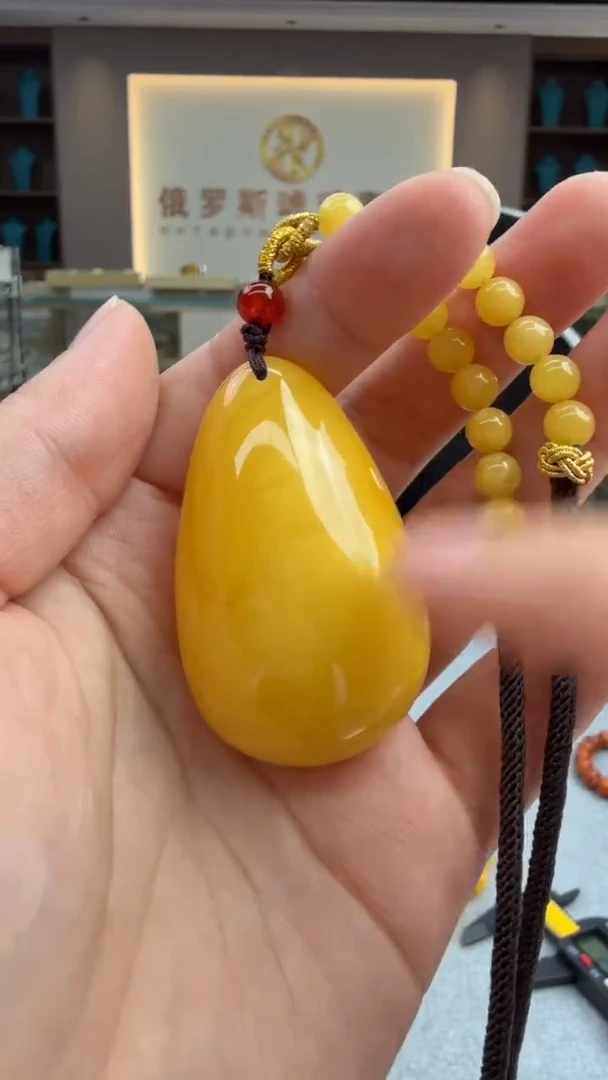 琥珀颈饰未镶嵌563秒拍号 假一罚三