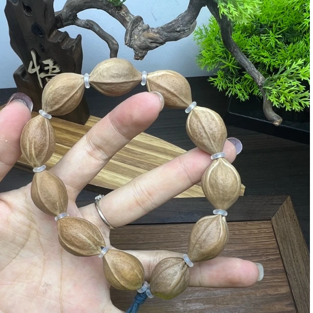19-25尺寸梅林铁核原生态素串核橄榄核手串