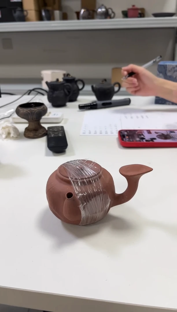 粗陶侧把壶侧把壶