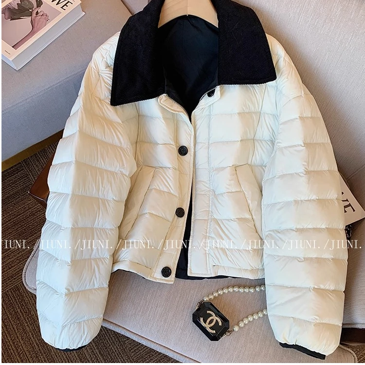 撞色翻领轻薄设计感女装冬季2025新款简约保暖百搭高级感棉服外套