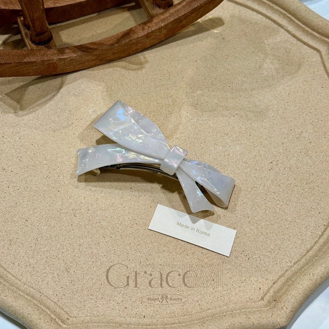 「人鱼蝴蝶结」韩国25弹夹一字夹盘发夹鸡毛毽子头