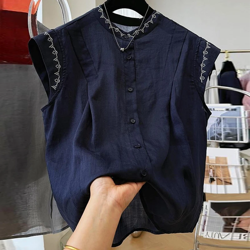 高级感漂亮独特无袖衬衫女2025夏季刺绣外穿时尚显瘦气质小衫