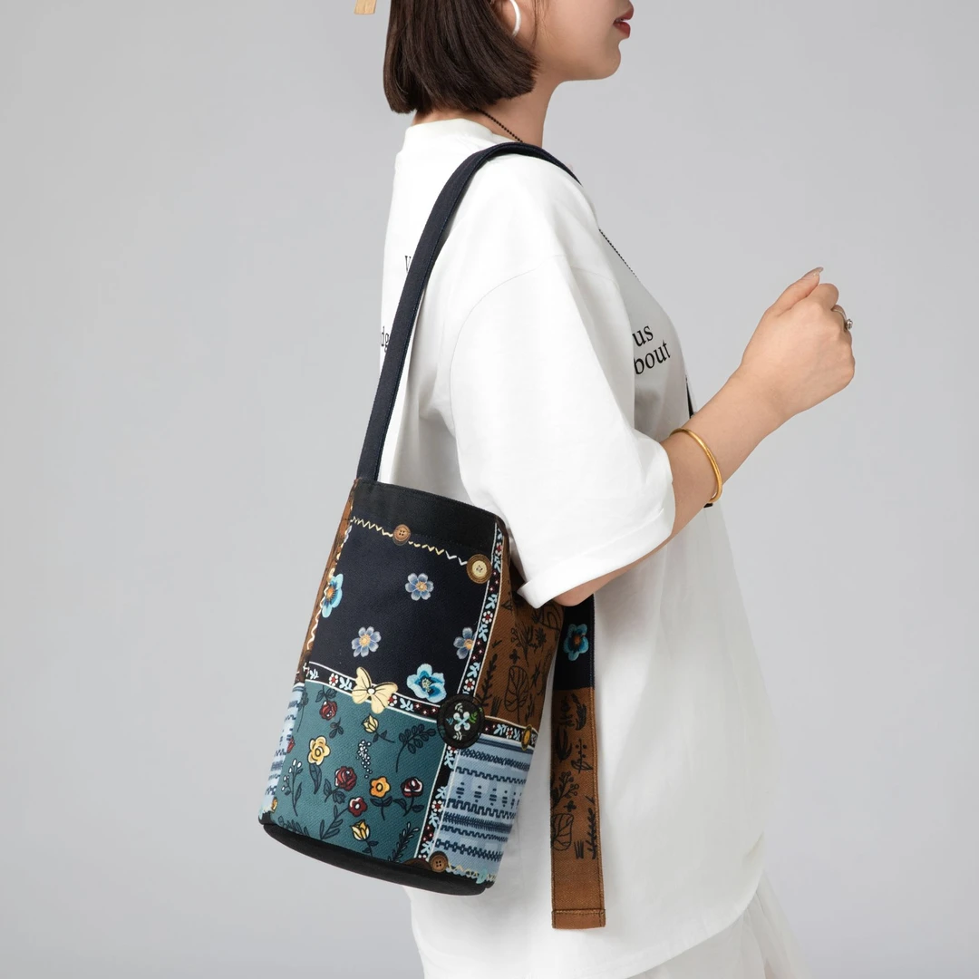 艺术鸭插画师原创繁花百搭飘带水桶包单肩斜跨包包手提小众通勤女
