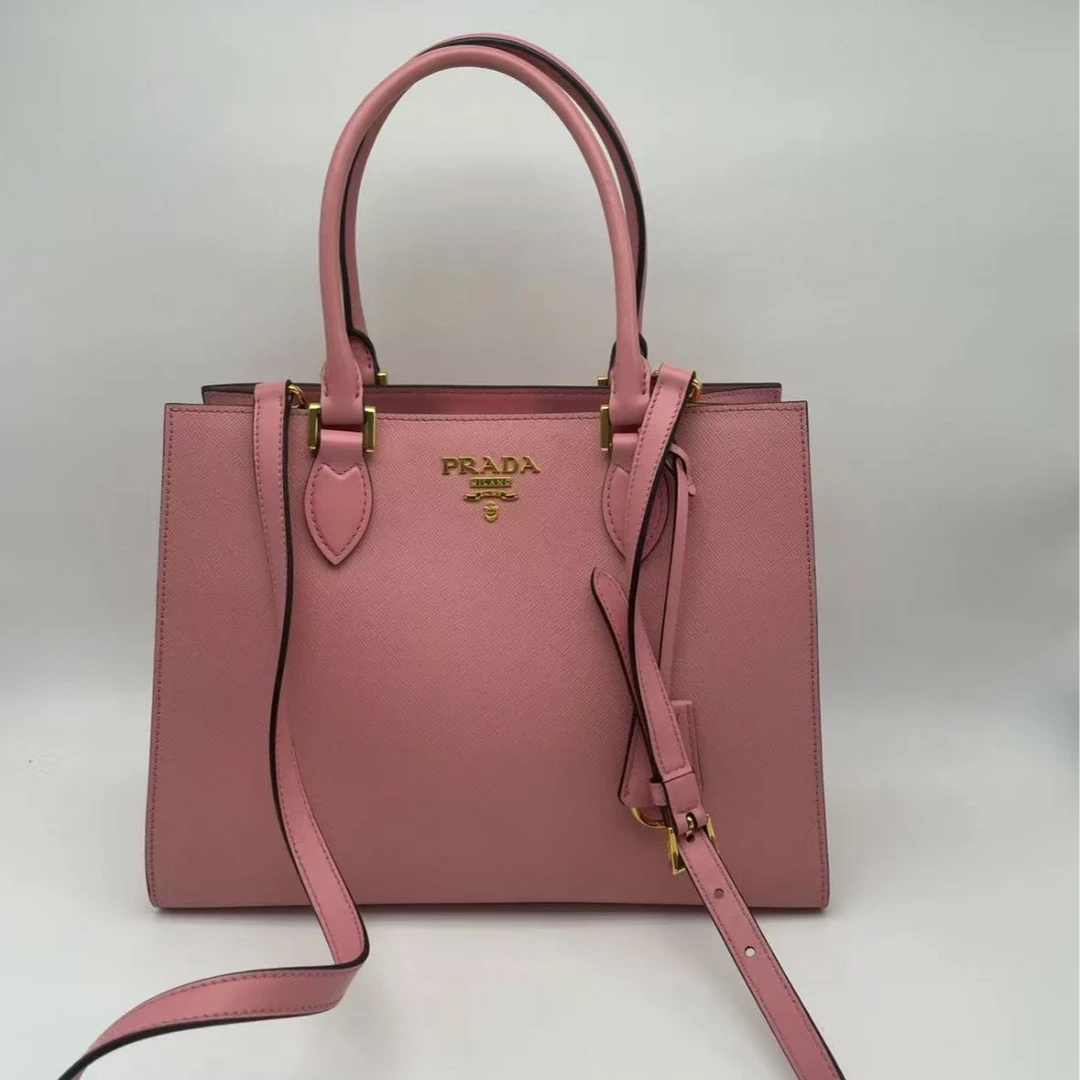 95新 Prada/普拉达 GGS粉色金扣牛皮手提单肩包 82654915