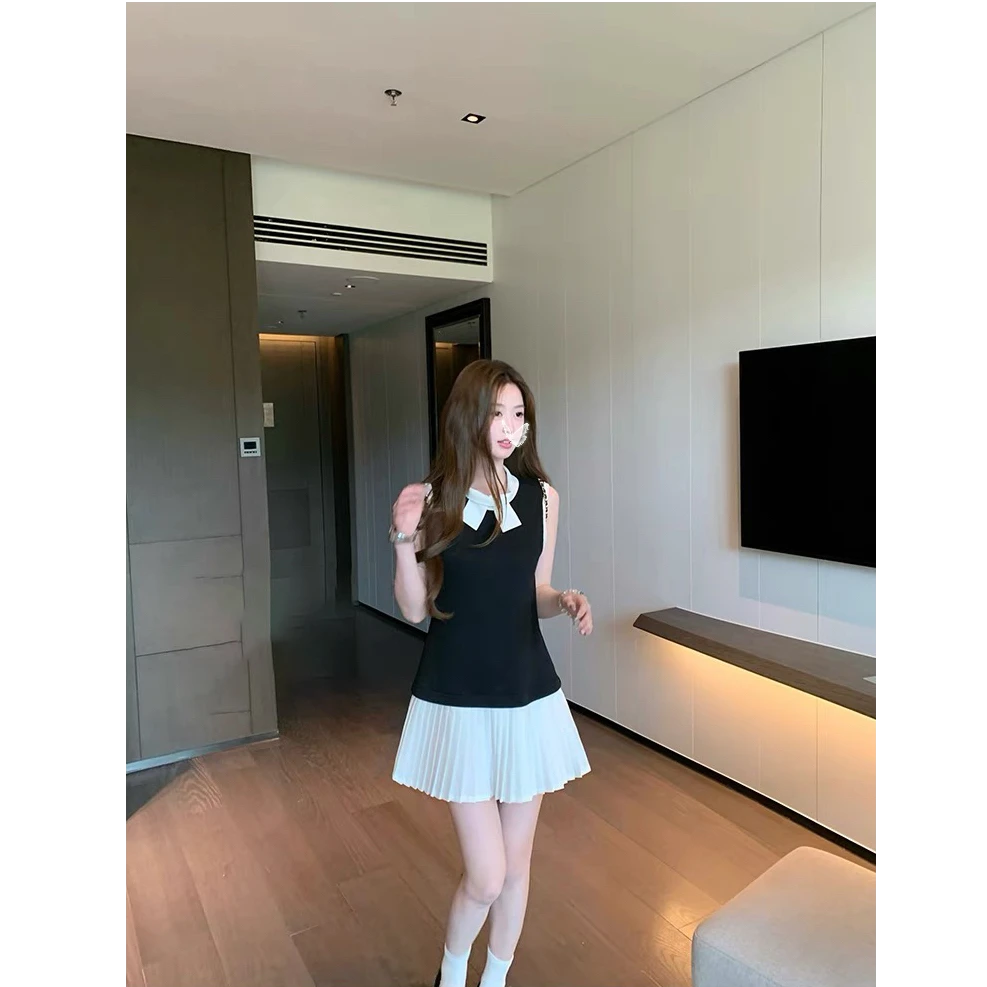 优秀的金蘑菇「千金高尔夫法式老钱小香黑白拼接百褶蝴蝶结连衣裙」