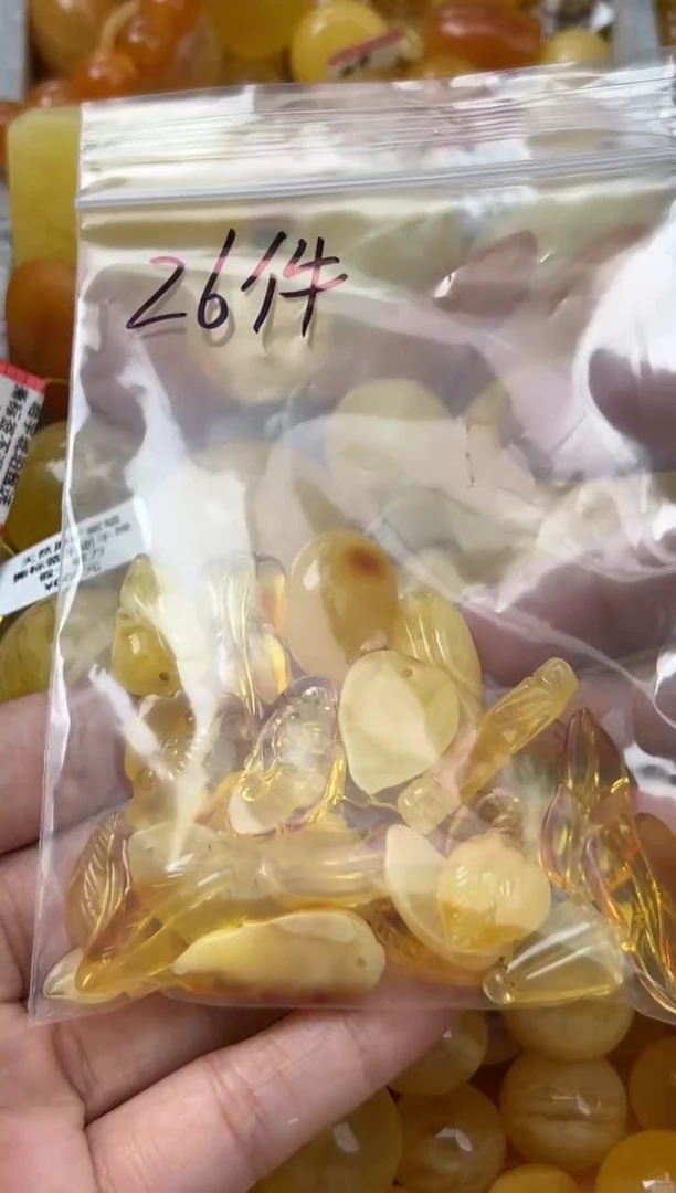 裸石琥珀未镶嵌红*瑰蜜蜡珠子带瑕疵 假一赔万