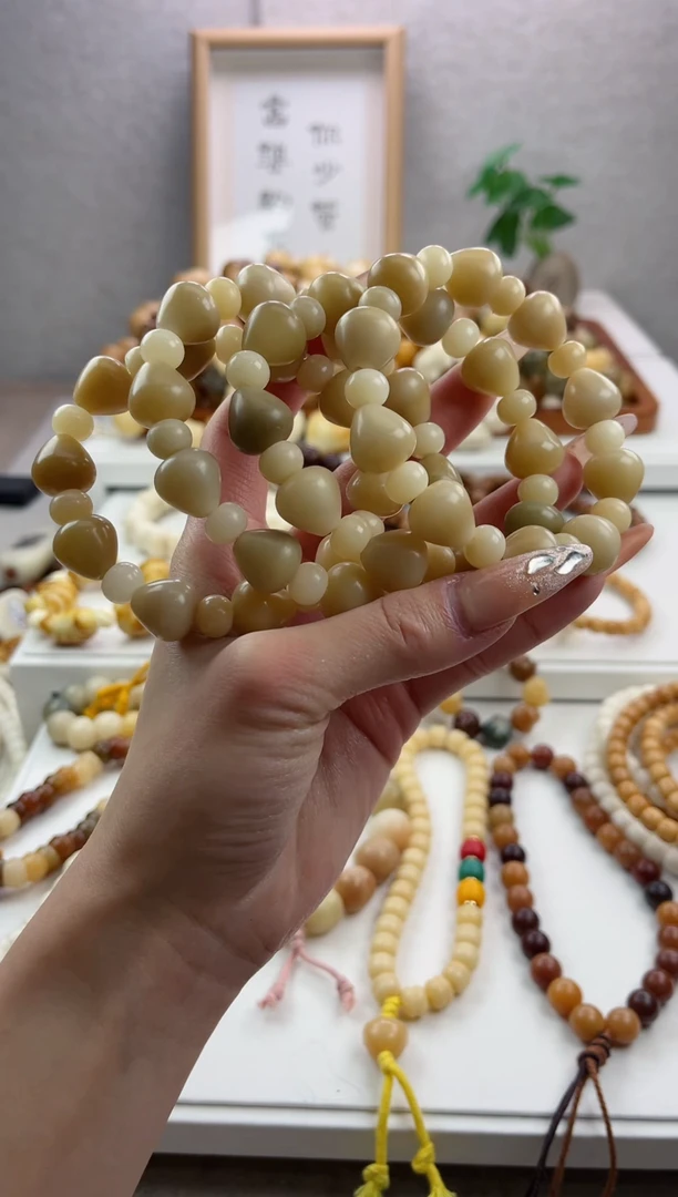 【闪购商品】菩提根/象牙果手串z65干磨蝴蝶结14mm瑕疵不补