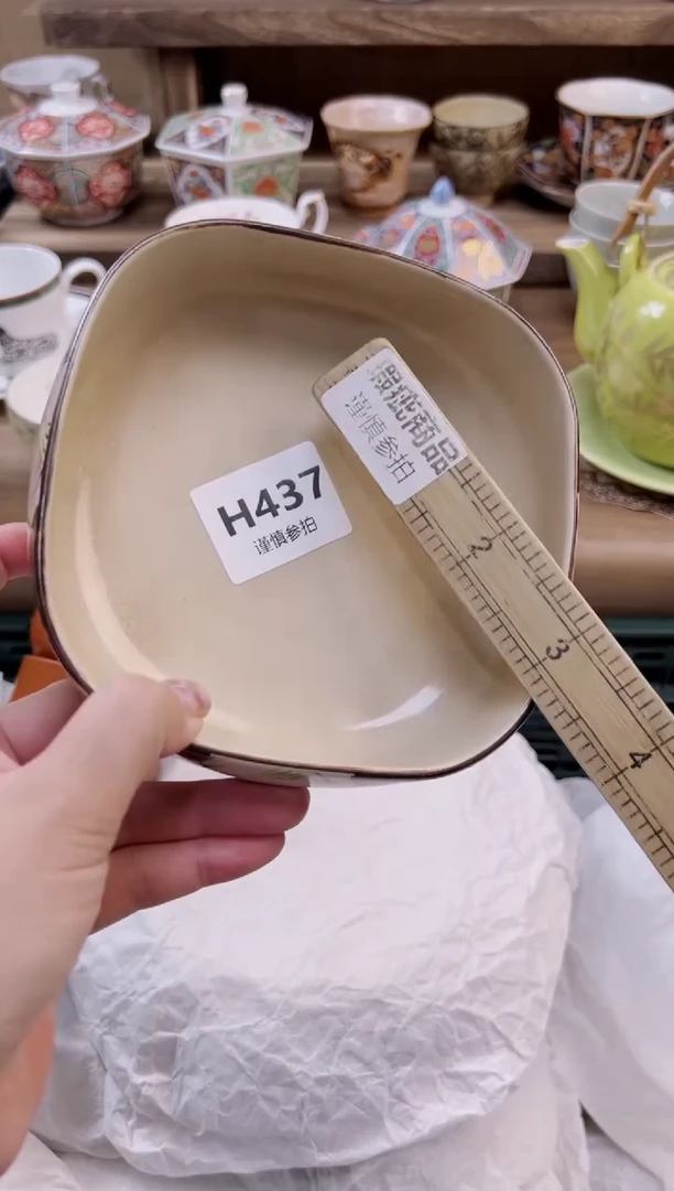 瓷片姑***丽         437