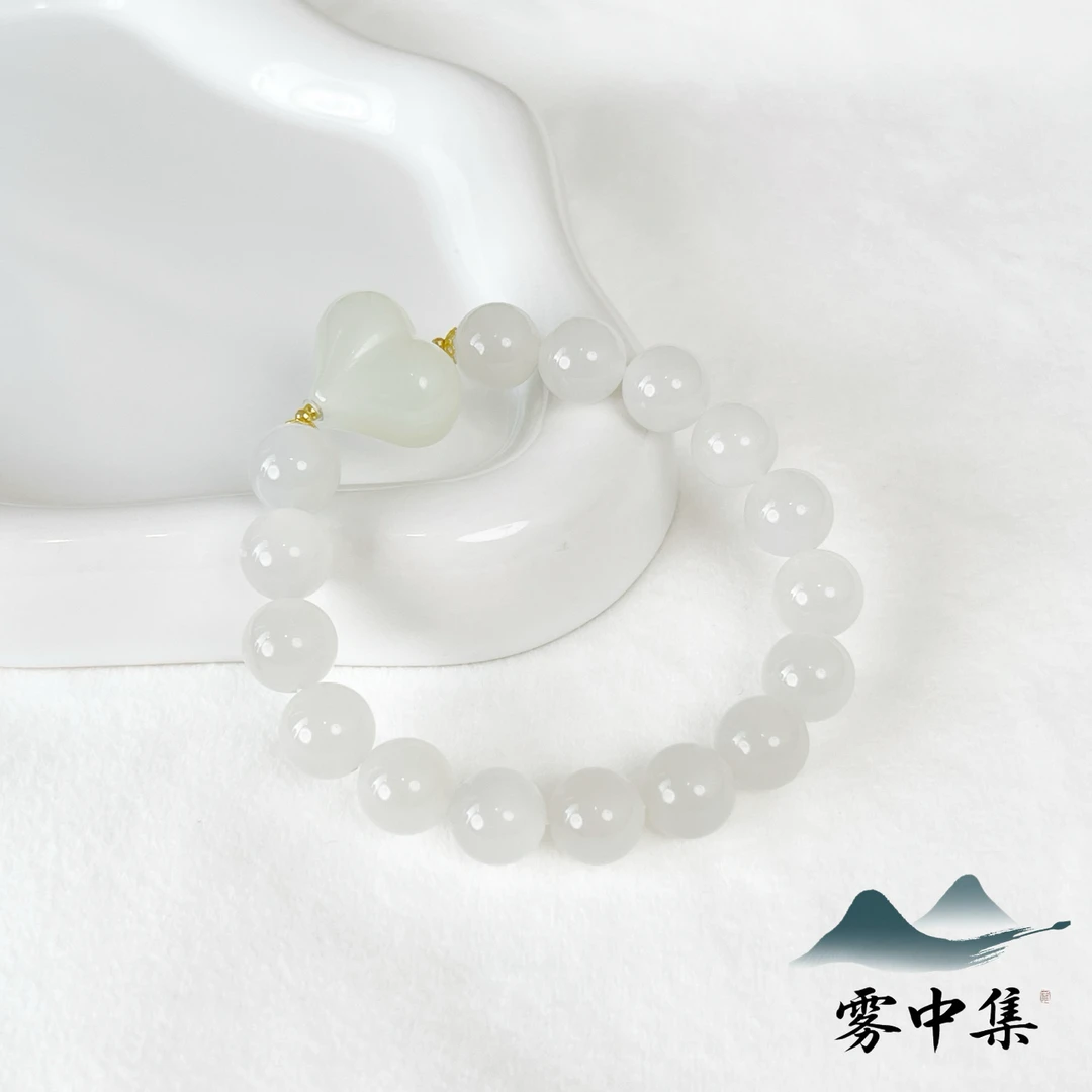 和田玉白玉手串9.8mm搭配晴水屁桃心18K金【雾中集】