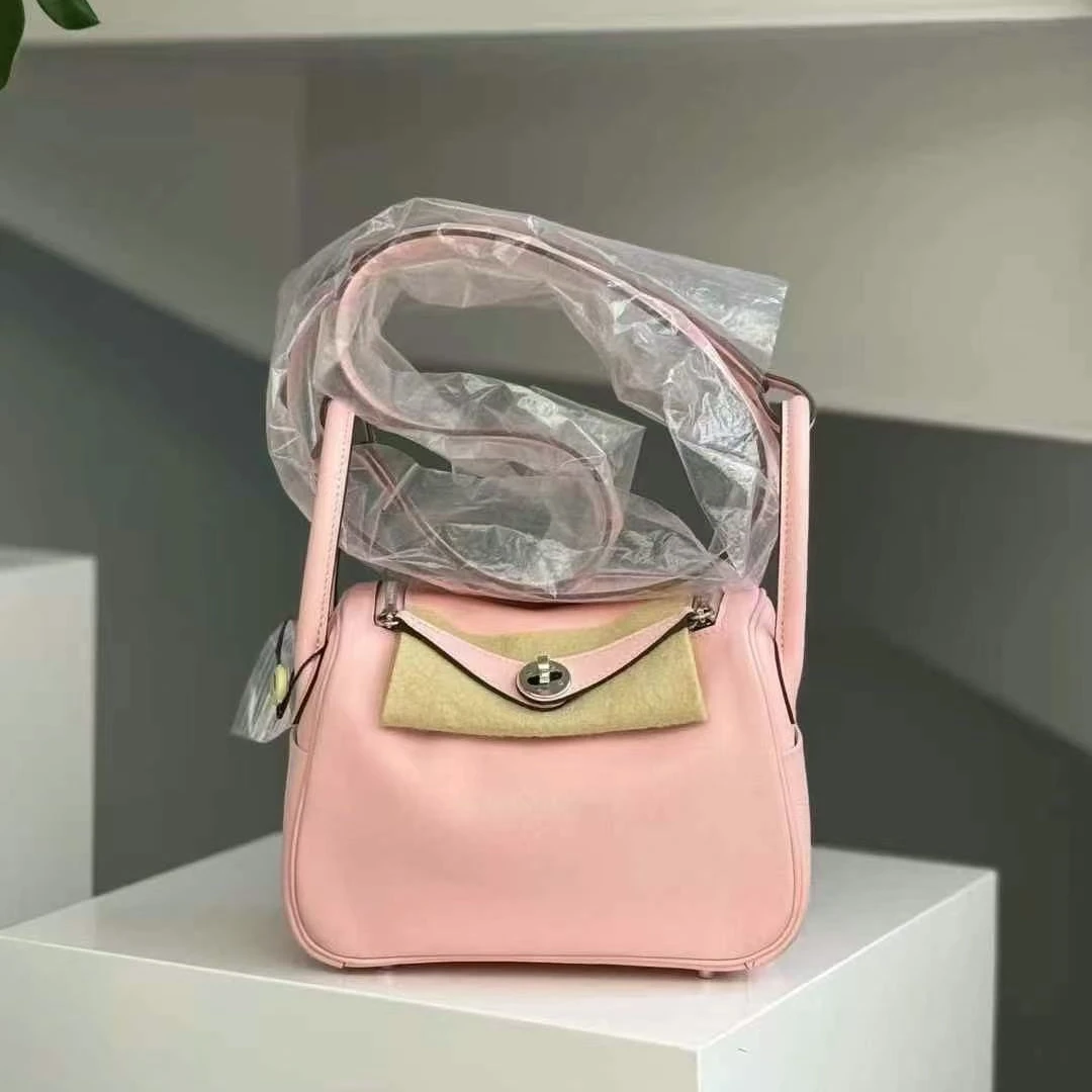 99新 Hermes/爱马仕 minilindy单肩包樱花粉 s皮 银扣 U刻