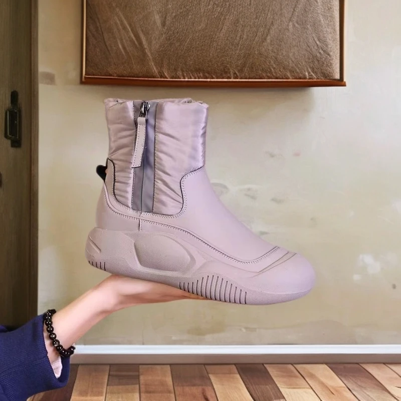 新款厚底加绒保暖防水加厚棉鞋平底毛绒圆头皮毛一体雪地靴女