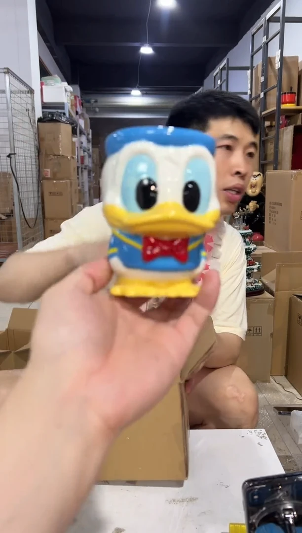 瓷片Q版唐老鸭水杯