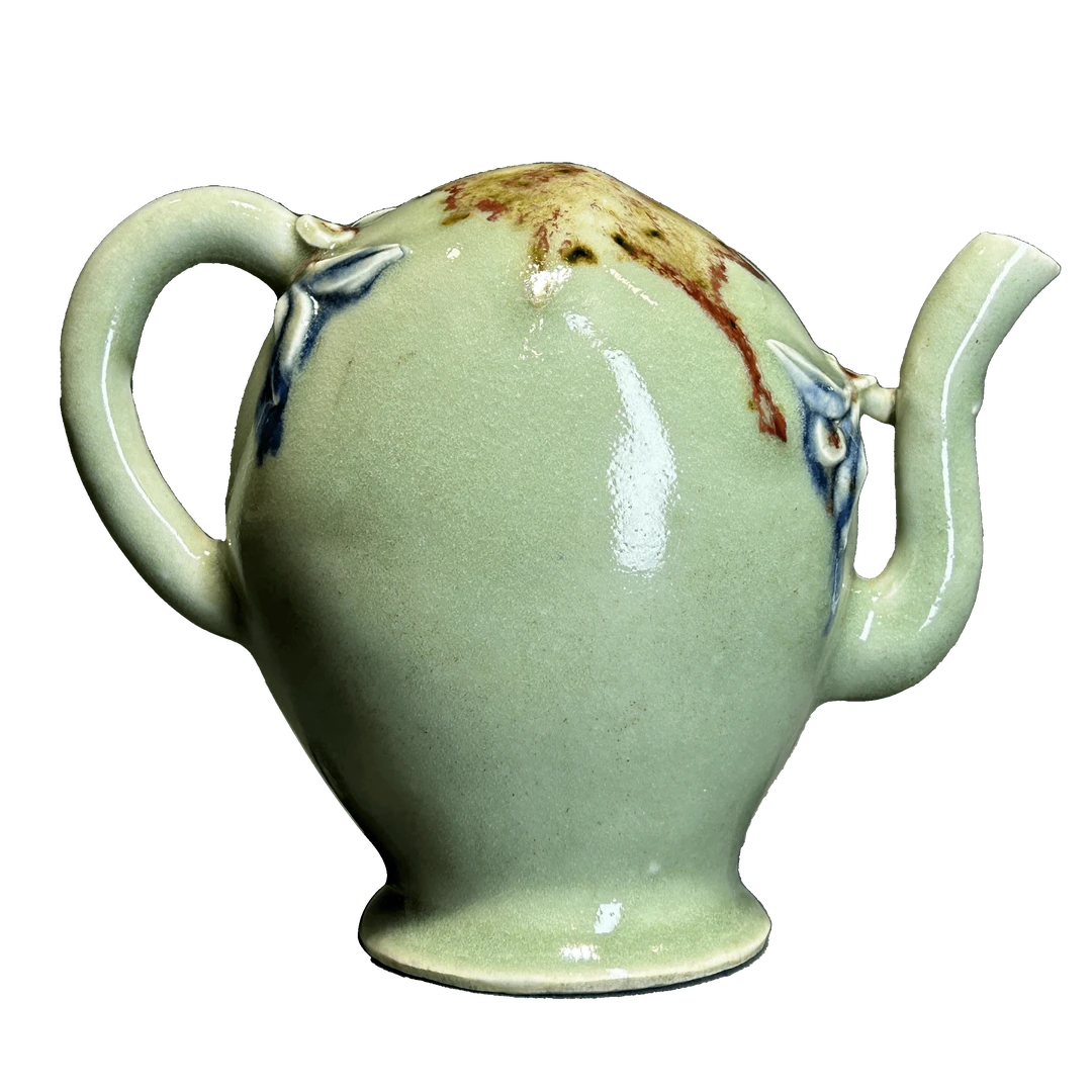 25321758x青花釉里红桃形倒流壶