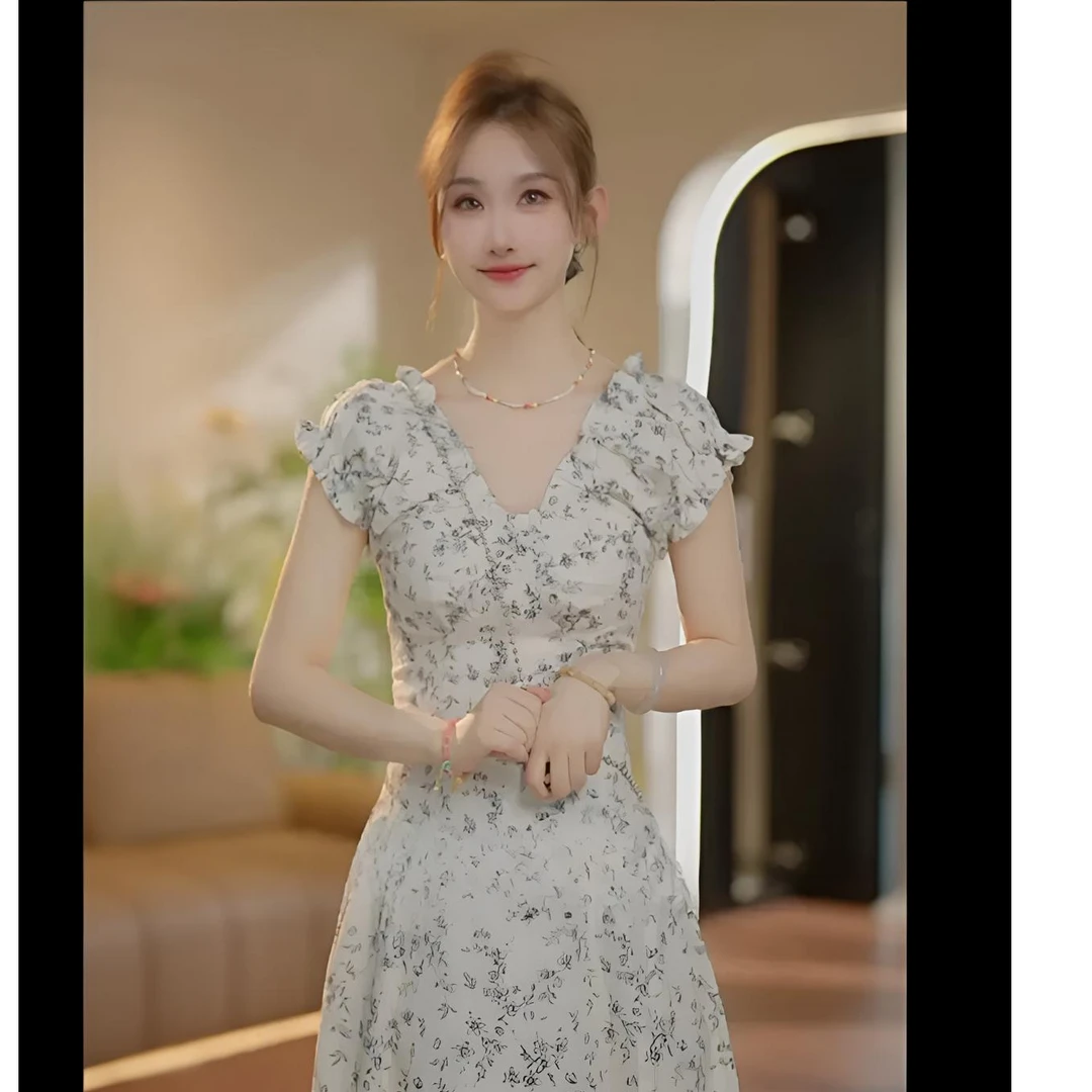 2025夏季新款印花法式赫本收腰显瘦短袖连衣裙女小众设计时尚高级