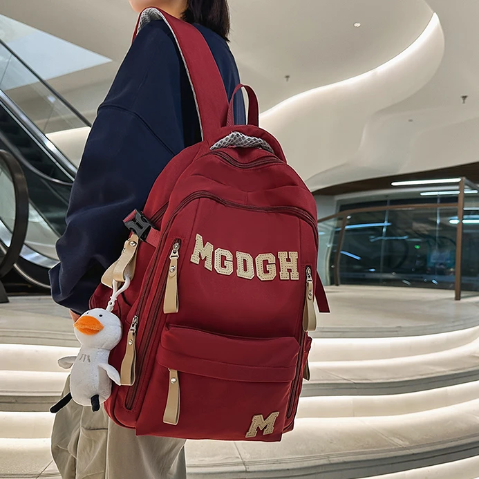 书包女爆款2025新款学生专用初中生高中双肩包大容量轻便旅行背包