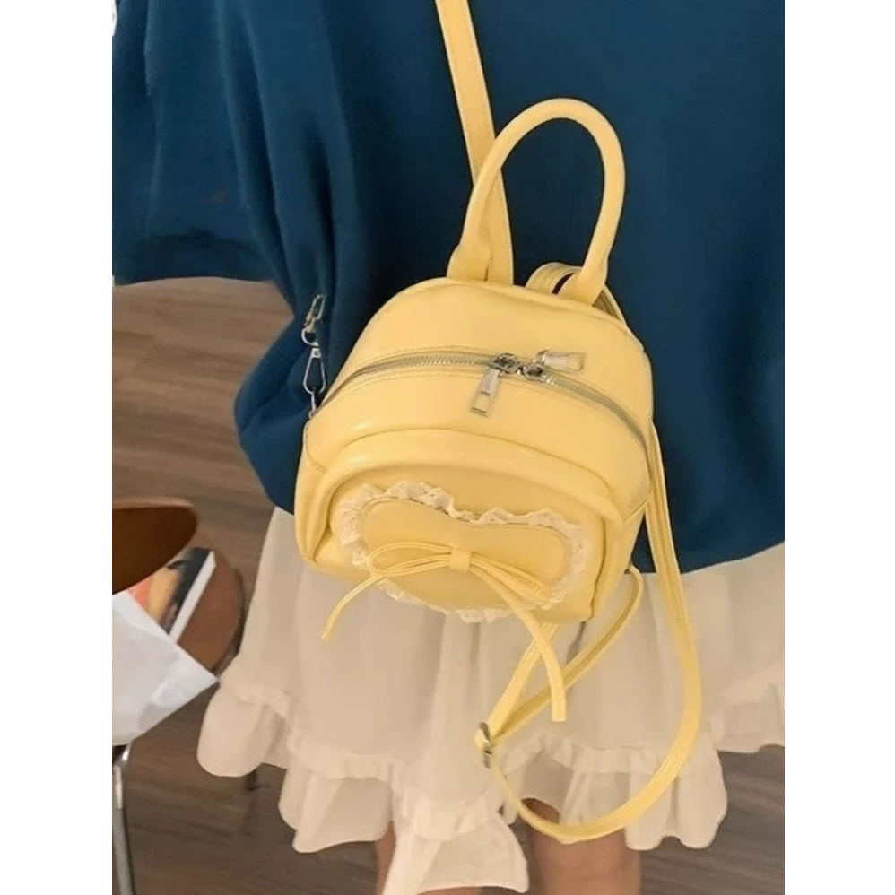 甜美可爱双肩包女2025新款时尚爱心蝴蝶结蕾丝学院风手提双肩书包