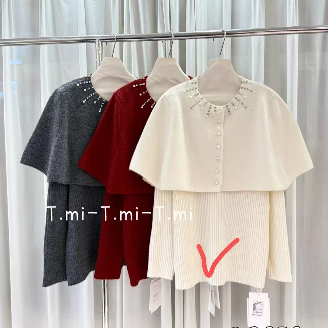 白色圆领一字肩设计针织毛衣