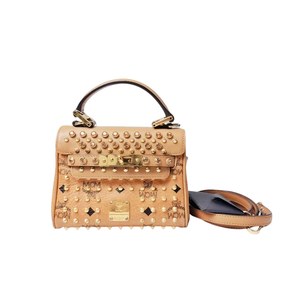 95新 MCM 安洁利严选手提斜挎包/0000726