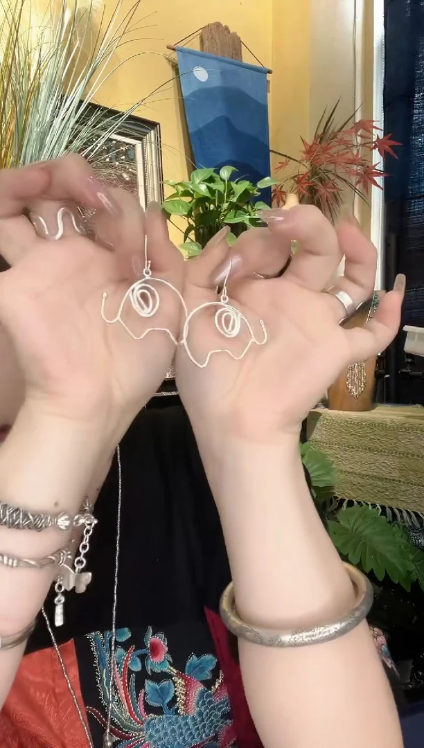 无925银树**云耳饰