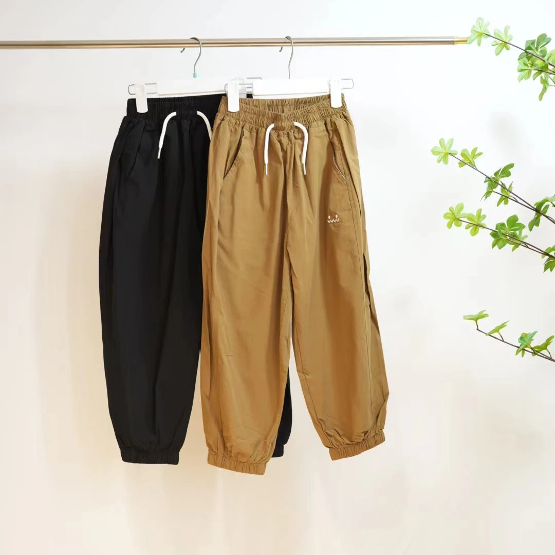 2-592-一款两色笑脸分割梭织裤儿童休闲束脚裤（17332）