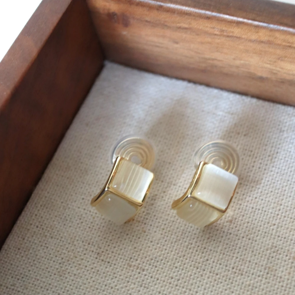 铜合金耳饰 H143猫眼石耳夹女无耳洞简约高级感蚊香盘百搭耳饰