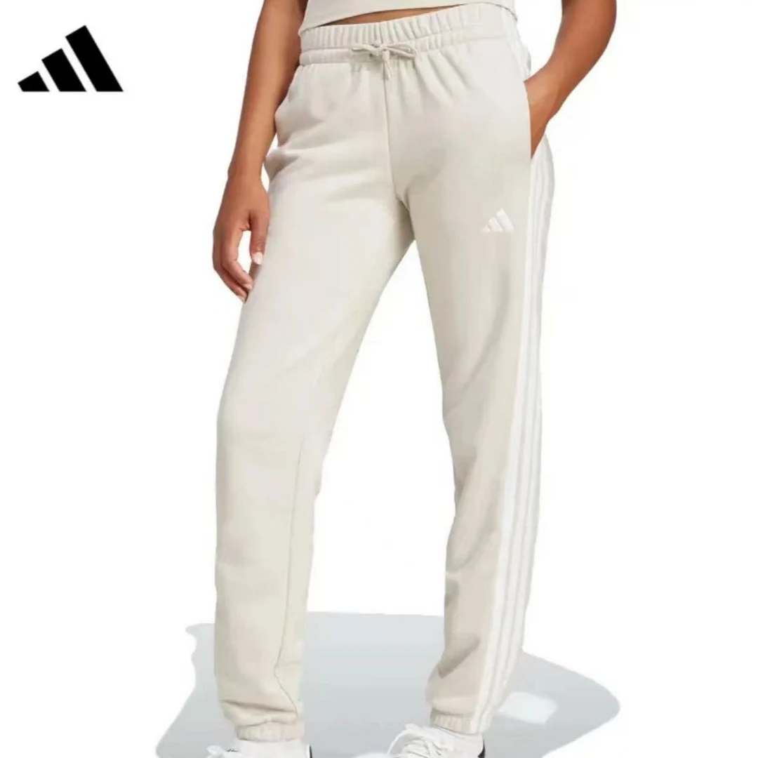 adidas/阿迪达斯春季女子运动休闲收口长裤JE0049