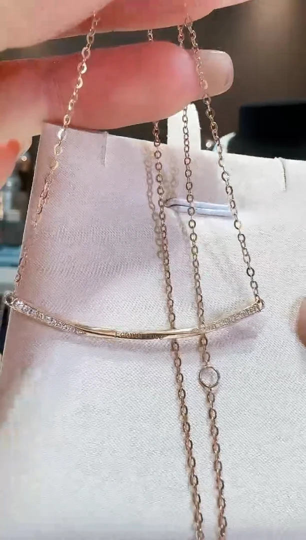 【闪购商品】钻石两边钻石笑脸项链18K金镶嵌...