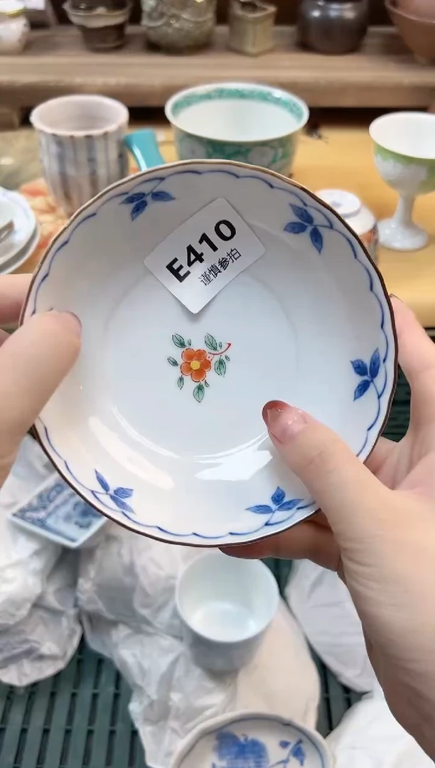 瓷片清***然      410
