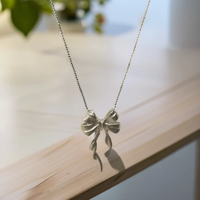 坠链均足银 蝴蝶结时尚百搭项链