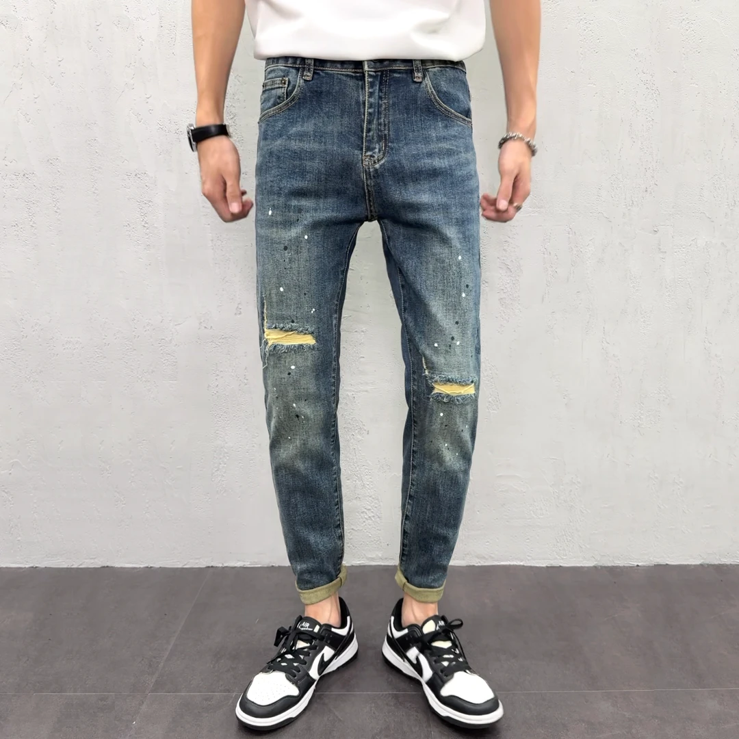 秋季男款修身小脚牛仔裤爆款2025新款泼墨水洗蓝韩版男士破洞长裤