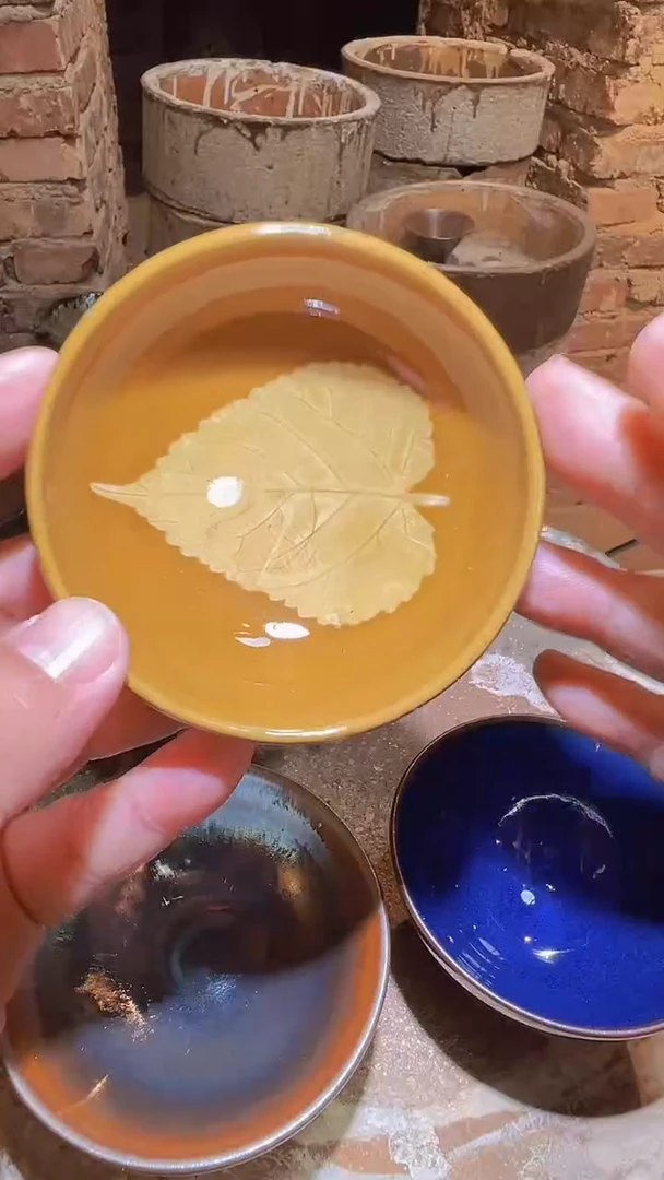 茶盏怡**艺非遗传承认修光明木叶