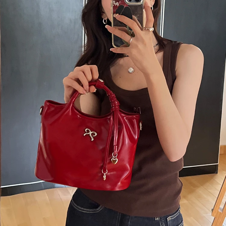 原创托特包2025新款高级感油蜡牛皮手提包通勤斜挎大包红色新娘包