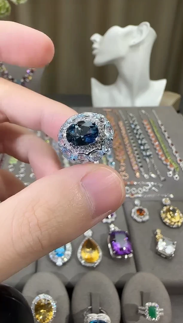 银S925镶嵌戒指托帕石10*8mm伦敦蓝戒指设计款