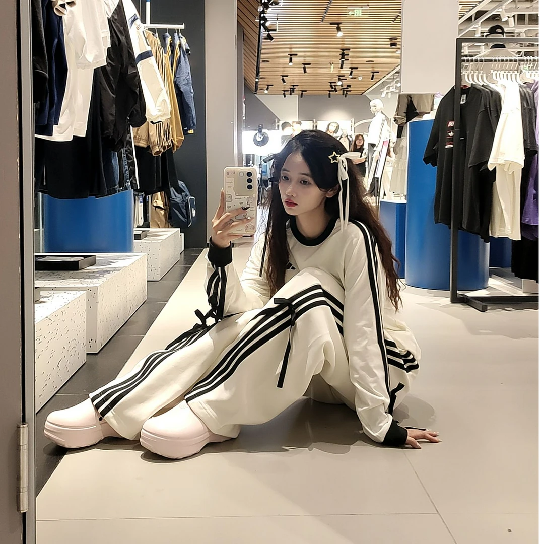 adidas阿迪达斯女款秋冬新款宽松舒适休闲百搭香蕉扭扭裤KG3857
