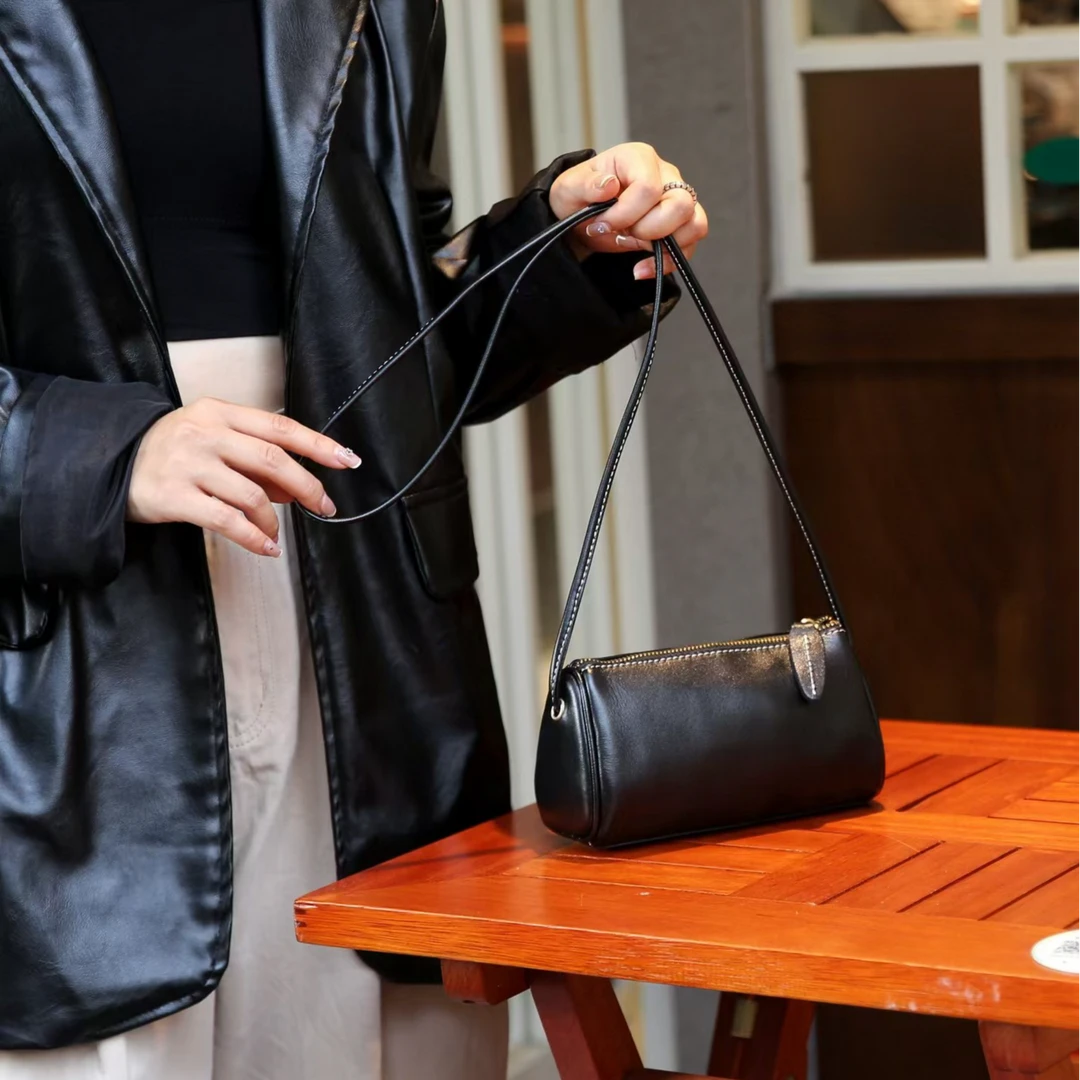 新品休闲真皮女包ins新款百搭时尚牛皮女腋下单肩小圆筒包5056