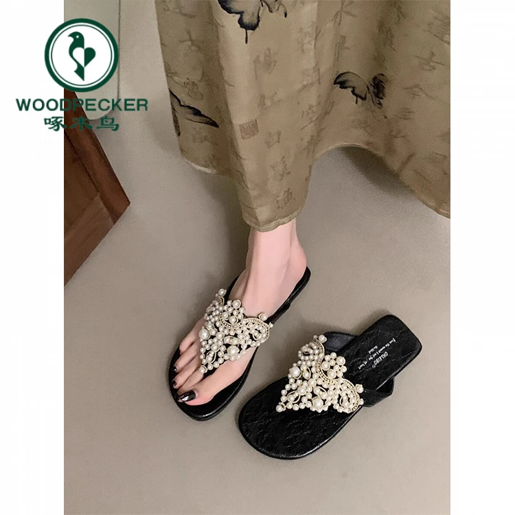 啄木鸟绝美珍珠夹趾平底凉拖鞋女外穿波西米亚度假风沙滩人字拖鞋