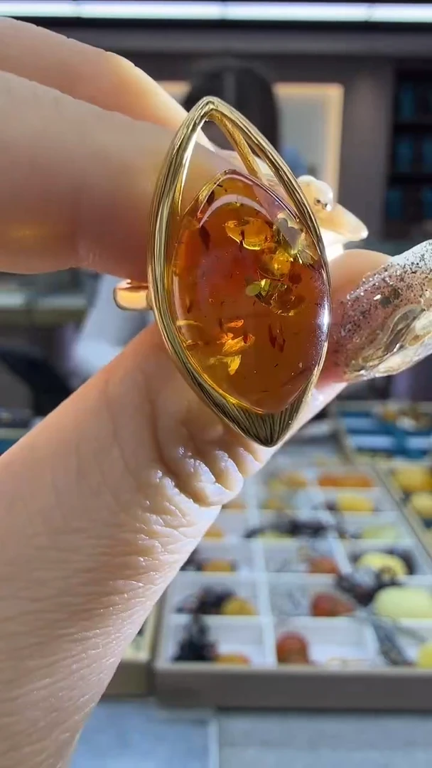 未镶嵌琥珀戒指13秒拍号 假一罚三