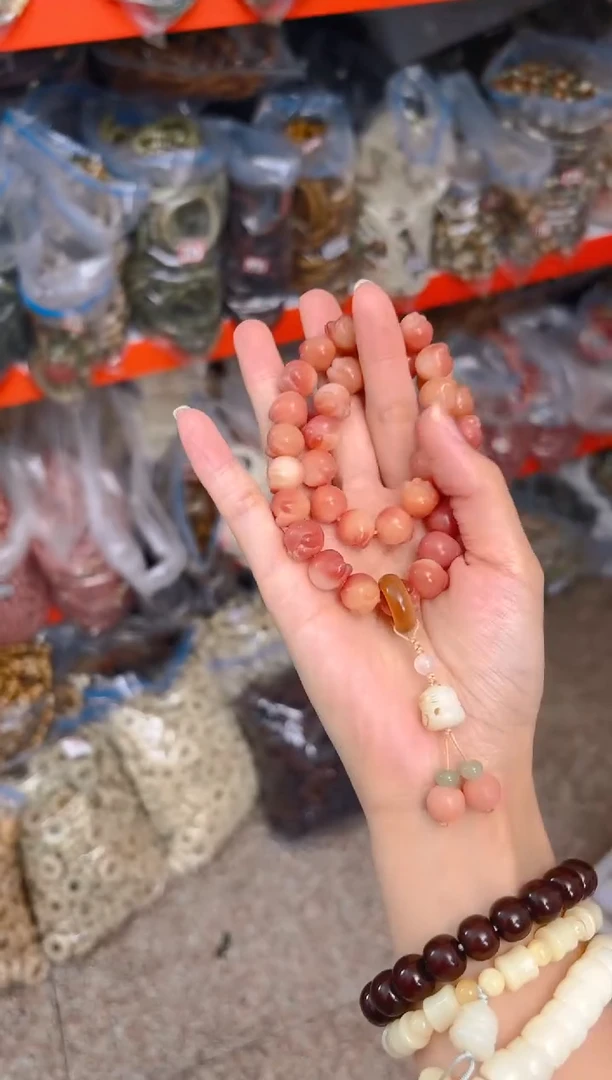 吊坠菩提根/象牙果粉色双圈猫爪手串