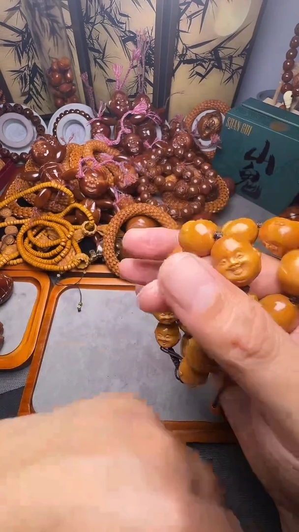 手串橄榄核十分开心
