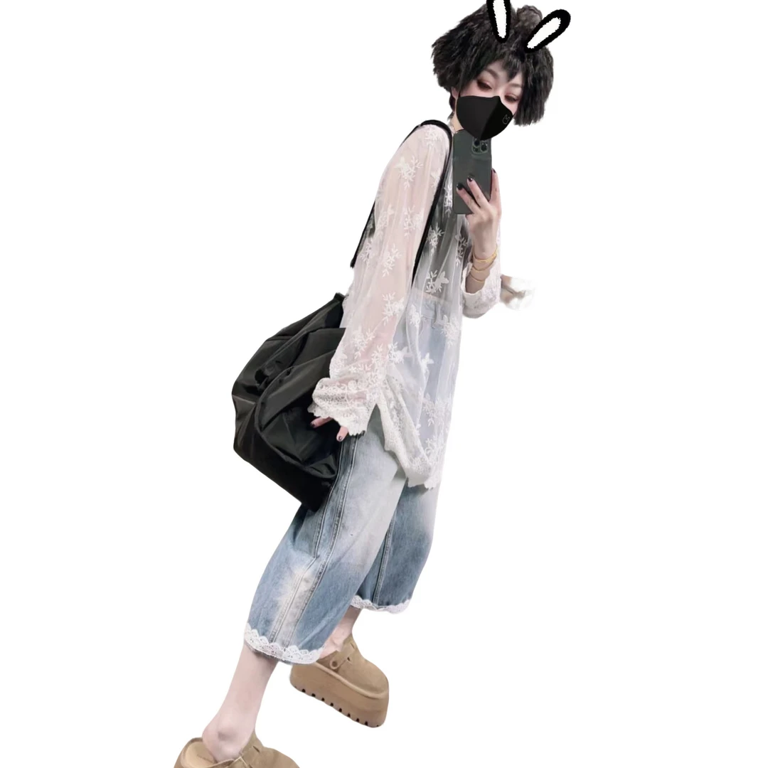 【佳老板】“6690”#春款韩版牛仔个性蕾丝弯刀裤