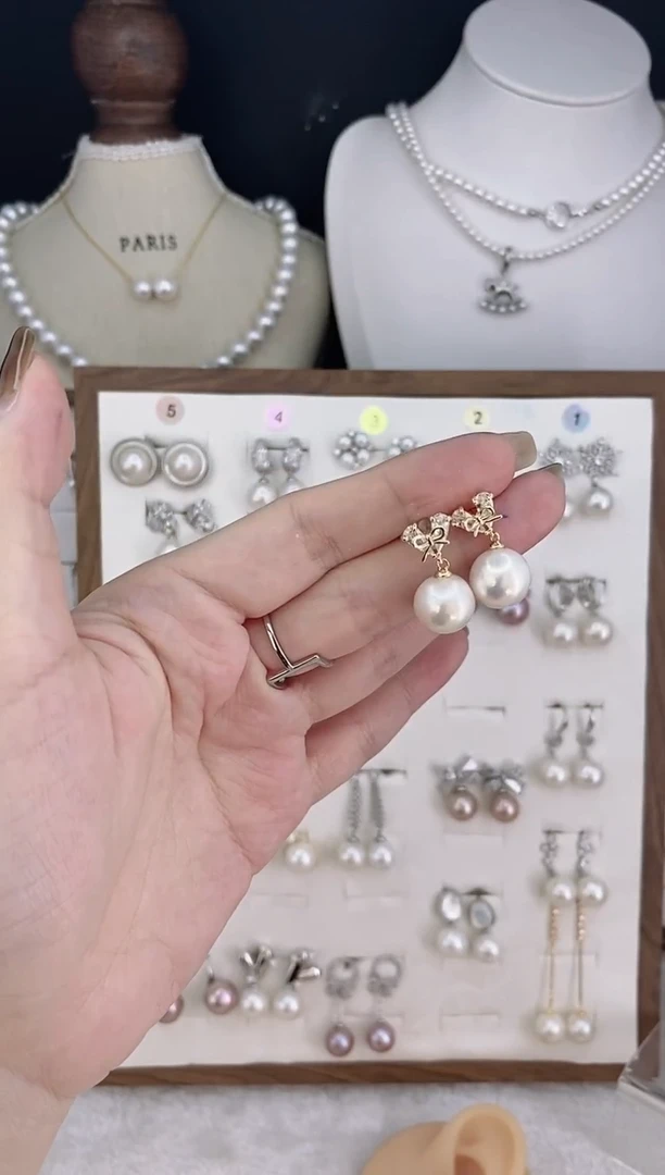 合金耳饰淡水珍珠哩****哩022