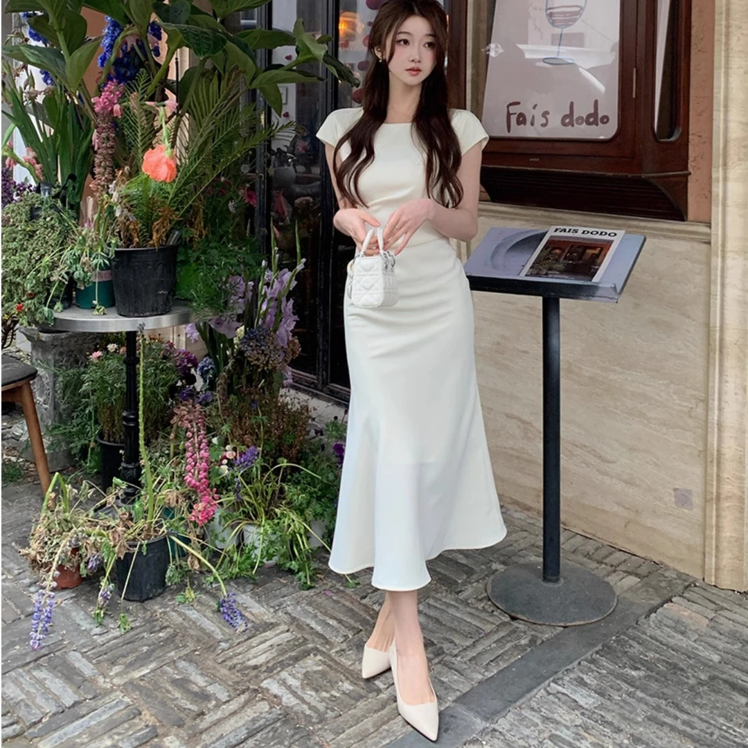 高级感白色连衣裙女夏季2025新款修身收腰显瘦法式气质鱼尾长裙子