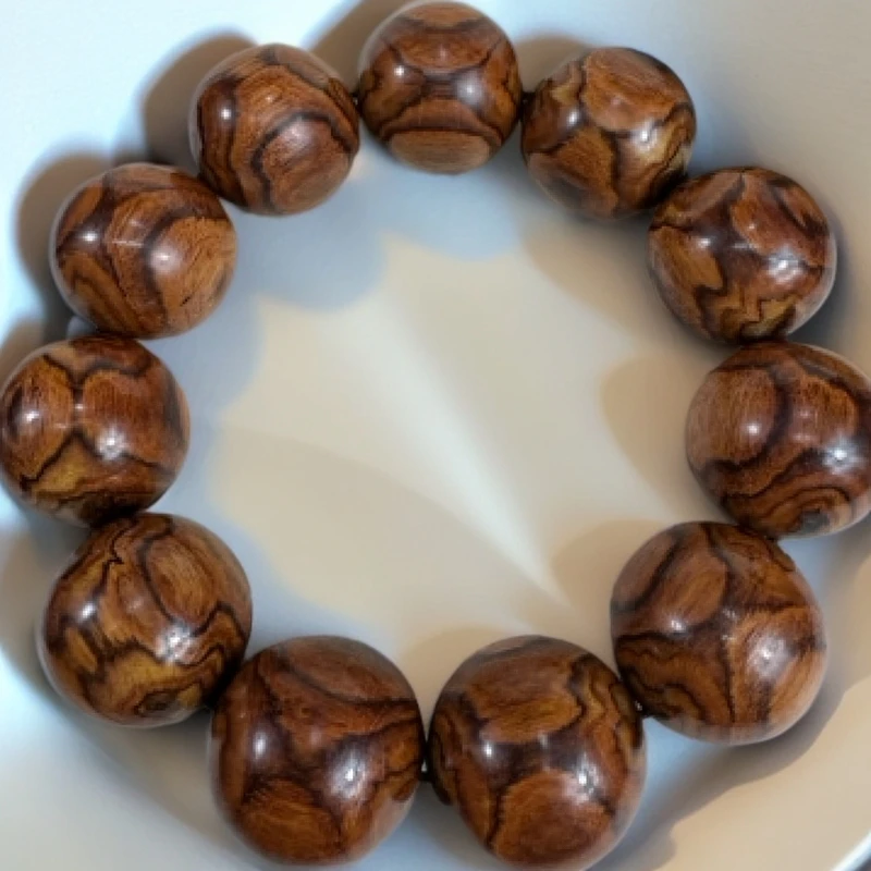 海南黄花梨对眼鬼脸纹2.5手串