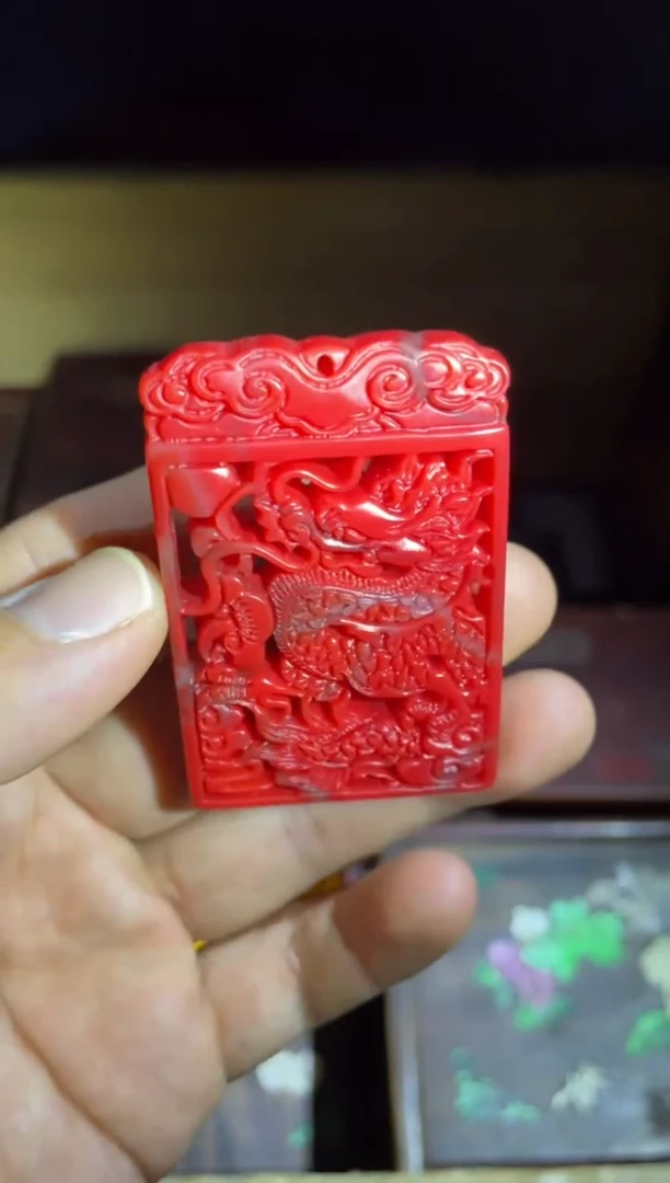 和田玉未镶嵌颈饰红钰镂空龙牌1件