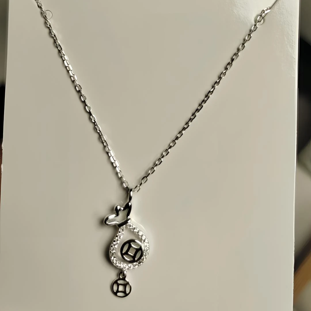 坠链均足银 990纯银项链女设计款福袋钱袋吊坠锁骨链套链送女朋友