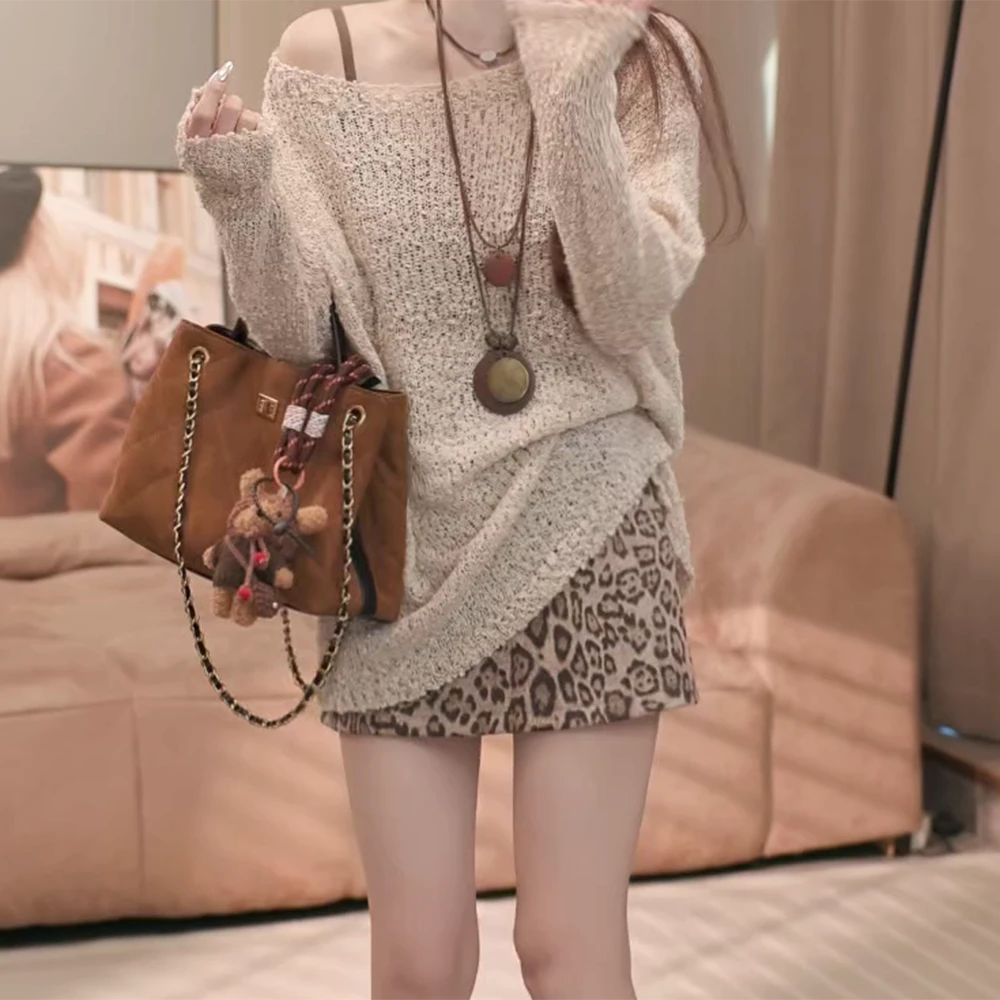 早秋新款韩版宽松显瘦圆领镂空设计长袖针织衫女C5955