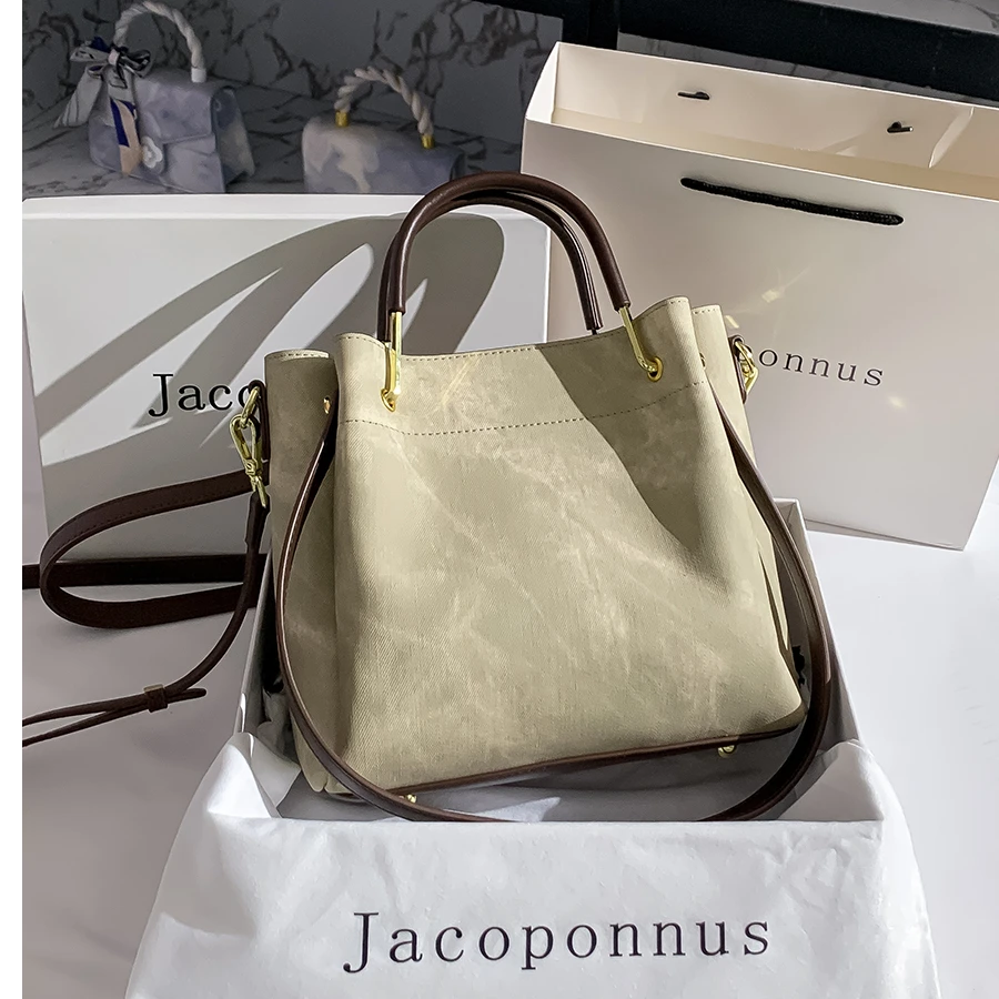 通勤母亲妈妈礼物真皮牛仔水桶包女2025新款质感小众流行手提斜挎