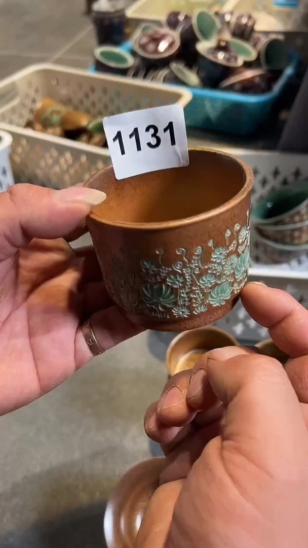 龙泉窑水草花融天微瑕1131