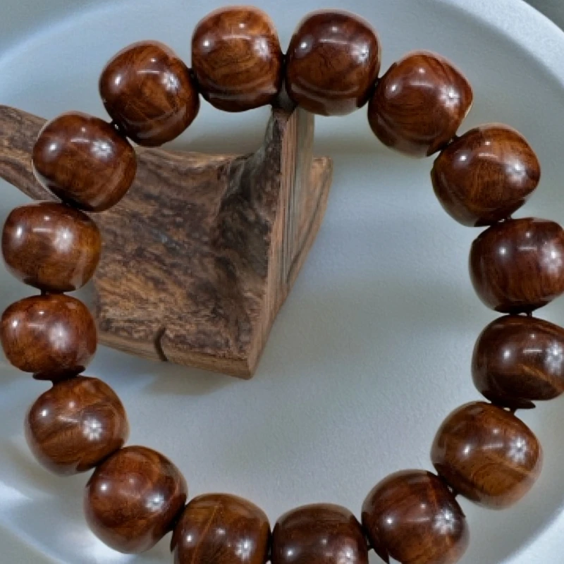 海南黄花梨百年老糠焦糖色水波纹1314手串